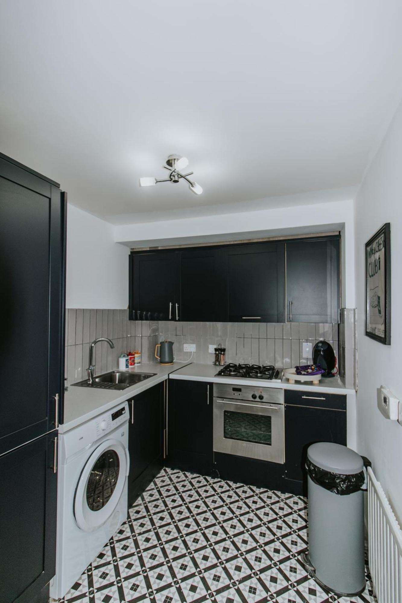 Whitehall Square Apartments- Queen's Quarters Apartment